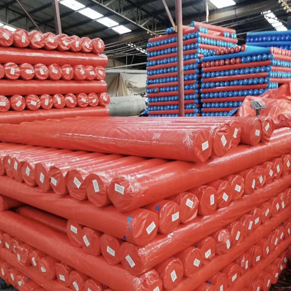 red pe tarpaulin rolls