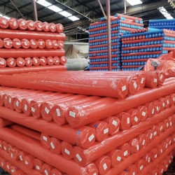 red pe tarpaulin rolls